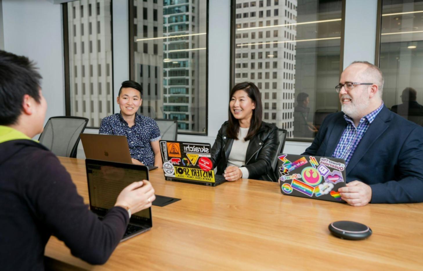 Professional financial analysis workshop with participants reviewing liquidity management case studies